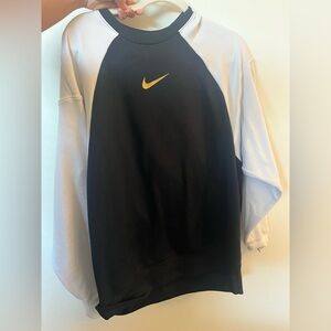 Nike Womens Black and White Crewneck Sweater with Gold Logo